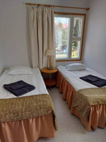 Фото номера Двухместный номер с 2 отдельными кроватями Отель Korpi Bistro &amp; Guesthouse г. Энонкоски 5